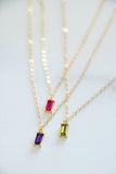 solitaire baguette birthstone necklace