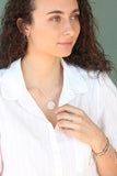 infinity hoop earrings { gold + silver }
