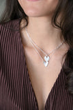 sculpted heart necklace { silver + bronze }