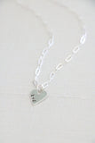 sculpted heart necklace { silver + bronze }