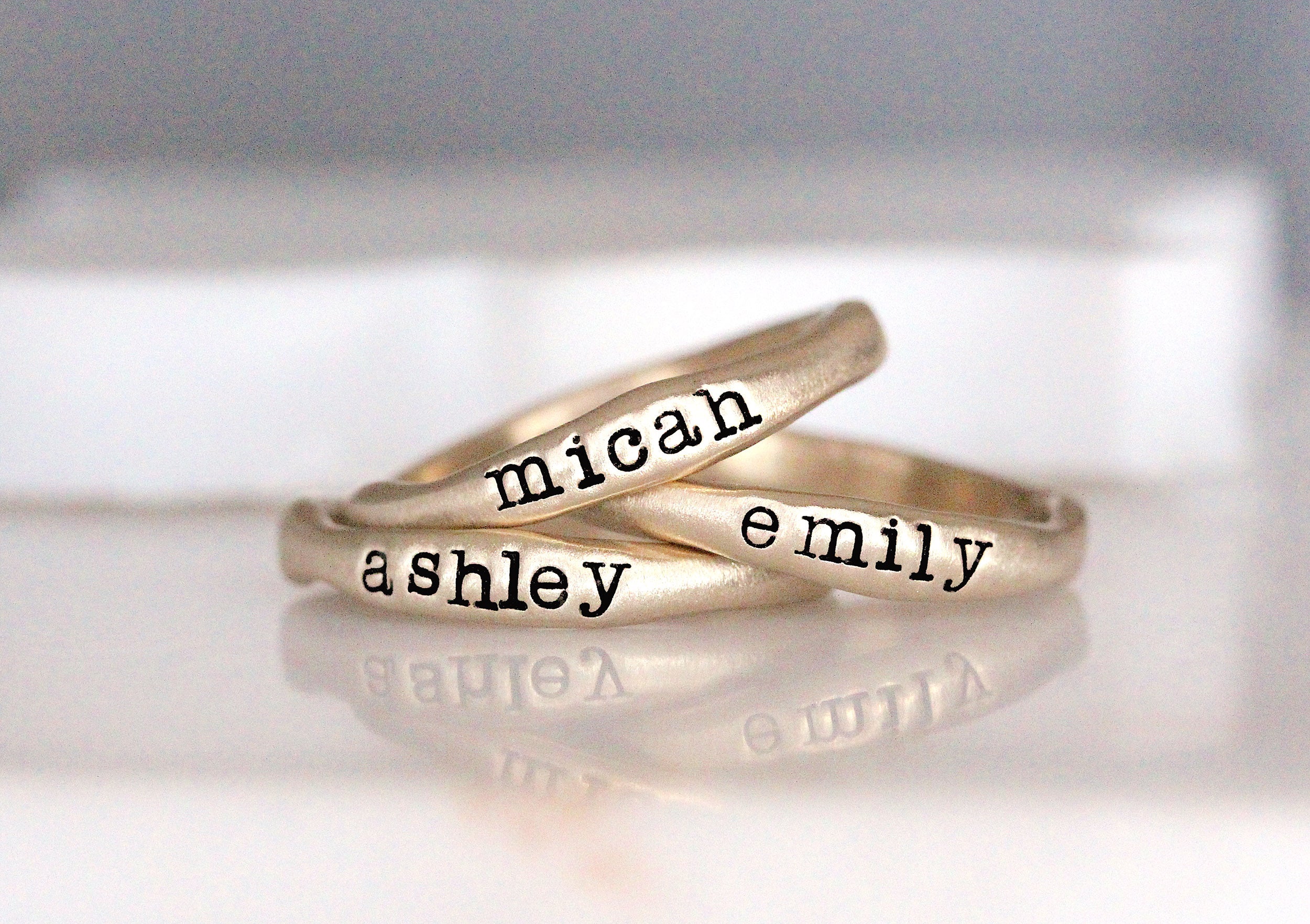 stackable name rings 10K yellow gold