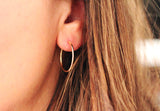 infinity hoop earrings { gold + silver }