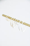 infinity hoop earrings { gold + silver }