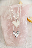 sculpted heart necklace { silver + bronze }